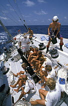 Crew aboard "The Card" as they cross the equator during the Whitbread Round the World Race, 1989.