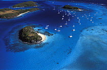 Yachts anchored inside the horseshoe reef in Tobago Cays, Grenadines, Caribbean.