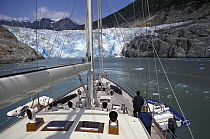118ft S&S designed superyacht, "Timoneer" approaches Dawes Glacier at the end of Endicott Arm, south east Alaska.