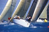 Bowman of Farr 40 "Atalanti XI" prepares the spinnaker pole for the windward mark rounding, Key West Race Week, 2000.