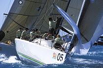 Spinnaker hoist at the windward mark aboard Farr 40 "Wahoo", Key West Race Week, 2001.