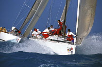 Crew aboard ID35 "Tomahawk" prepare for a spinnaker hoist during Key West Race Week, 1997.