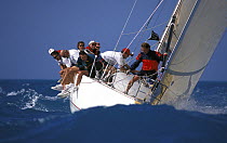 Bowman prepares the spinnaker pole for the windward mark rounding, Key West Race Week, 1997.