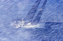 Yacht beats upwind in breezy conditions off Miami, SORC, 1999.