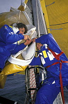 Sail repairs on "Team EF", Whitbread Round the World Race, 1997-1998.
