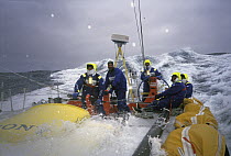 Waves on the deck aboard "EF Language" as she moves through the Southern Ocean during the Whitbread Round the World Race, 1997-1998.