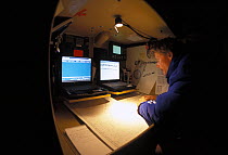 Navigation station on board "EF Language" during the Whitbread Round the World Race, 1997-1998.