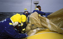Sail change on "Team EF" in the Whitbread Round the World Race, 1997-1998.