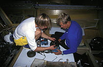 Repairs on "Team EF", in the Whitbread Round the World Race, 1997.