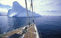 Bow of yacht "Kotick" cruising towards an iceberg, Antarctic Peninsula.