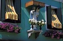 Statue of Madonna and Jesus child, Burano, Italy.