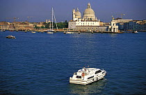 Cruising towards Canale Grande (Great Canal) Santa Maria della Salute church, Dogana point, Venice, Italy.