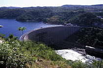 Kariba Dam, Zimbabwe is located approximately halfway down the Zambezi River. The dam was surrounded by controversy, both environmentally and socially, it is an impressive monument to man's engineerin...