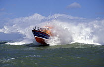 Trent class lifeboat crashing through heavy seas during trials in the Solent.