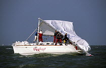 Beneteau 42.7 "Garrety" is dismasted during a local race on the Solent, UK.