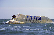 Crew of Ultra 30, "Hoya", attempt to right the boat after a capsize in strong conditions.