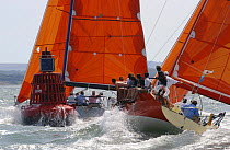 Two Ker 11.3's on day 4 at Skandia Cowes week round the leeward mark in a strong current, Tuesday August 5th, 2003.
