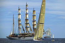 J-Class classic "Ranger" and tall ship sailing off Newport during the Tall Ships Parade, Rhode Island, USA