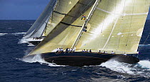 Close racing between the J-Class yacht "Velsheda" sailing upwind of the new replica "Ranger" at Antigua Classic Yacht Regatta, Caribbean, 2004.