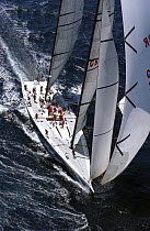 "Mari Cha IV" under full sail racing off Falmouth Harbour during Antigua Race Week, 2004.