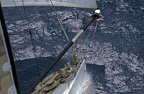 Bowman at the end of the spinnaker pole aboard the ZX86 "Morning Glory", Antigua Race Week, 2004.