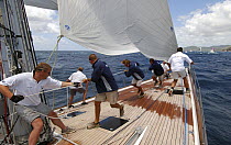 Crew trim while during a race off Falmouth harbours, Division A, Ocean Race. Friday April 30th, Antigua Race Week, 2004.