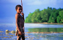 Young boy with fishing spear, New Ireland, Papua New Guinea, Oceania