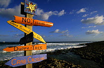 Signpost on Cobalt Coast, Grand Cayman, Cayman Islands.