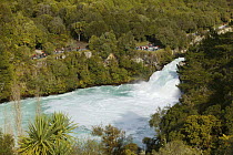 Huka Falls, Wairakei River, Taupo, New Zealand. Huka Falls is one of New Zealand's most visited attractions, more than 220,000 litres of water cascades over the cliff face per second.