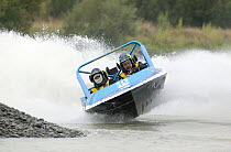 Jet sprint racing, Waimakariri River, Christchurch, New Zealand. ^^^Jet sprint boat racing is a form of racing sport where trailerable speed boats, powered by water jet propulsion rather than by conve...