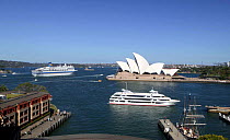 Ferries in Sydney Harbour with the Opera House, Sydney, Australia.