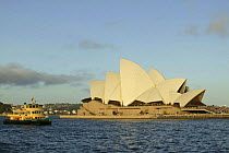Sydney Opera House and ferry boat, Sydney Harbour, Australia.