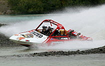 Jet sprint racing, Waimakariri River, Christchurch, New Zealand. ^^^Jet sprint boat racing is a form of racing sport where trailerable speed boats, powered by water jet propulsion rather than by conve...