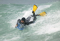 Body boarding at St Clair Beach, Dunedin, New Zealand.