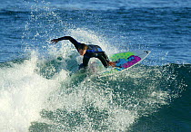 Surfing at St Clair Beach, Dunedin, New Zealand.