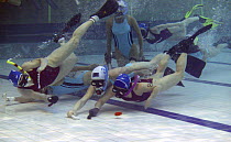 British women's underwater hockey team in action playing against Canada, World Underwater Hockey Championships, Christchurch, New Zealand.