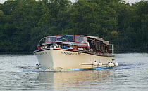 River cruiser "Tanqueray 3" on the Norfolk Broads, England, UK.