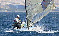 Dean Barker of New Zealand competing in the fourth round of the Men's Single Handed Dinghy Finn, Olympic Games, Athens, Greece, 15 August 2004.  Editorial Use Only.