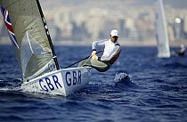Ben Ainslie completes the 10th round of the Single Handed Finn during the Olympic Games, Athens, Greece, 19 August 2004.  Editorial Use Only.