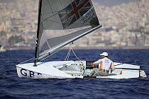 Ben Ainslie completes the 10th round of the Single Handed Finn during the Olympic Games, Athens, Greece, 19 August 2004.  Editorial Use Only.