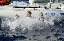 Women's Yngling crew Shirley Robertson, Sarah Webb and Sarah Ayton celebrate after winning Great Britain's first Gold Medal at the Olympic Games, Athens, Greece, 19 August 2004.  Editorial Use Only.