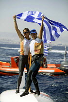 Sofia Bekatorou and Aimilia Tsoulfa celebrate after winning the Gold Medal in the Women's 470, Olympic Games, Athens, Greece, 19 August 2004.  Editorial Use Only.