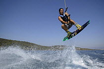 A wakeboarder jumping in the air, Marverde, Turkey. Model Released.