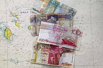 Banknotes and a local chart from the Seychelles islands, Indian Ocean