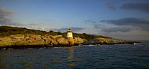 Castle Hill Lighthouse (Est. 1890) near Newport, Rhode Island, marking the East Passage into Narragansett Bay.