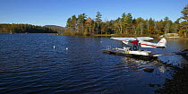 Seaplane docked on the water, Maine, USA.