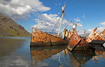 Wrecked seal catchers "Dias" and "Albatross" serve as a reminder of human life at the abandoned whaling station at Grytviken, South Georgia.