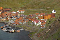Grytviken, a deserted whaling station, active from 1918-1963, as seen from a hill top above King Edward point, South Georgia. The museum can be seen in the foreground.