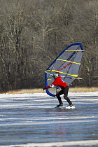 Sail skating on Worden Pond, Rhode Island, USA.