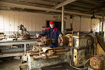 The photographer at a lathe in the machine shop at the abandoned whaling station in Grytviken, South Georgia.